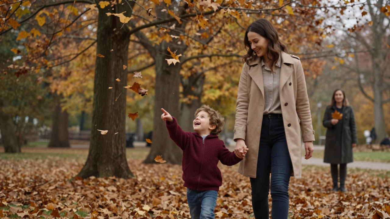 A mother and child walking together in autumn leaves, sharing a joyful moment.