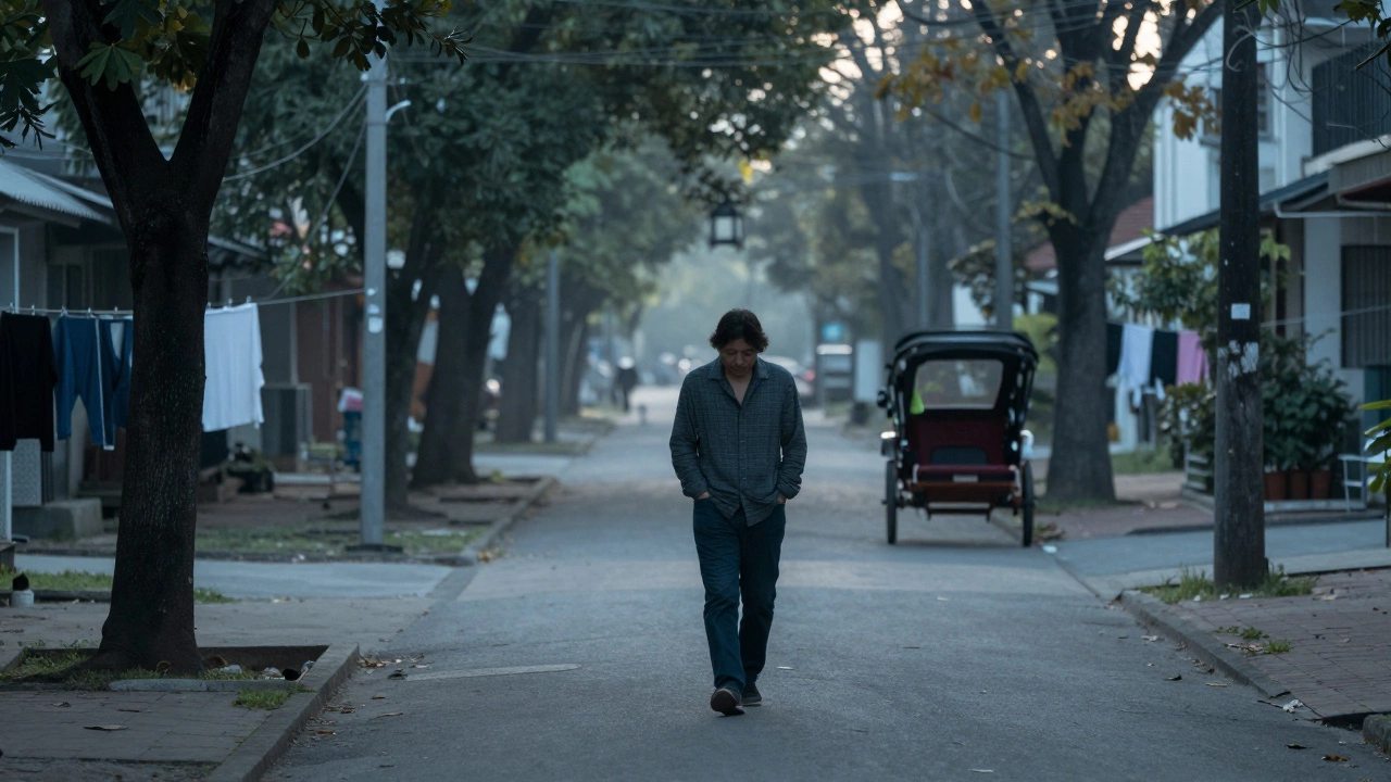 Someone walking peacefully along a tree-lined path at dawn in an urban setting.